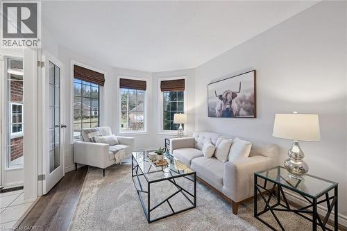 Living room featuring wood finished floors and baseboards - 68 Newman Drive, Cambridge, ON - Indoor Photo Showing Living Room