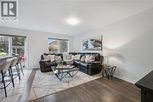 Living room featuring wood finished floors and baseboards - 68 Newman Drive, Cambridge, ON - Indoor Photo Showing Living Room