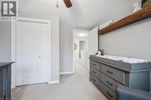 Bedroom featuring light colored carpet, a closet, and a ceiling fan - 68 Newman Drive, Cambridge, ON - Indoor