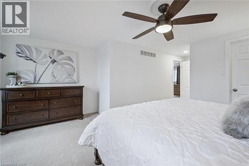Bedroom with light colored carpet and a ceiling fan - 68 Newman Drive, Cambridge, ON - Indoor Photo Showing Bedroom