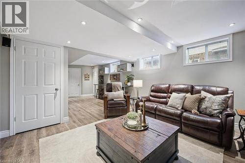 Living area with light wood finished floors and recessed lighting - 68 Newman Drive, Cambridge, ON - Indoor Photo Showing Other Room