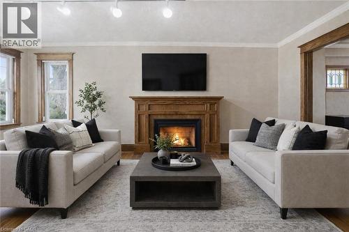 Virtually Staged - 88 Cline Avenue N, Hamilton, ON - Indoor Photo Showing Living Room With Fireplace