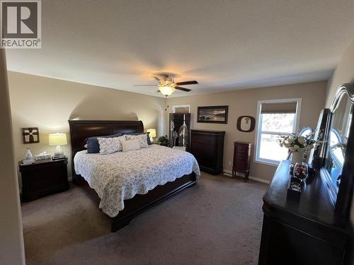 4 Reserve Road, Fort Nelson, BC - Indoor Photo Showing Bedroom