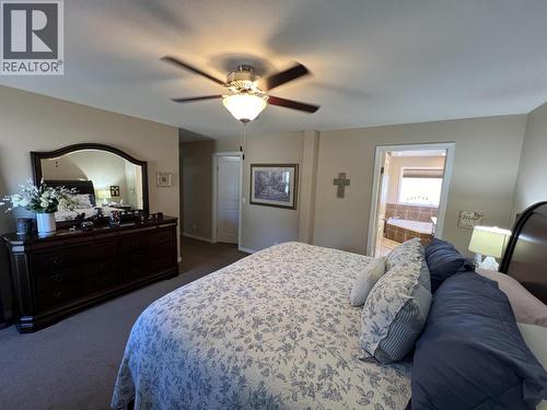 4 Reserve Road, Fort Nelson, BC - Indoor Photo Showing Bedroom
