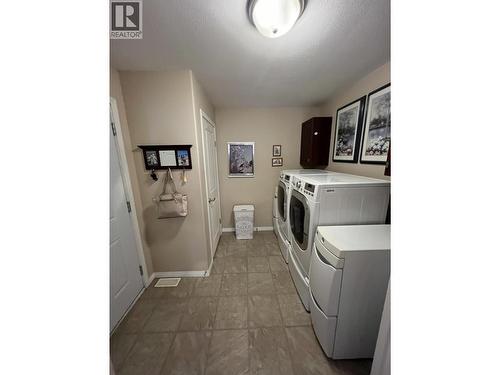 4 Reserve Road, Fort Nelson, BC - Indoor Photo Showing Laundry Room