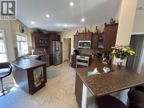 4 Reserve Road, Fort Nelson, BC - Indoor Photo Showing Kitchen With Double Sink