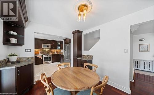 Dining room with dark wood-type flooring and baseboards - 1550 Woodeden Drive, Mississauga, ON - Indoor Photo Showing Dining Room