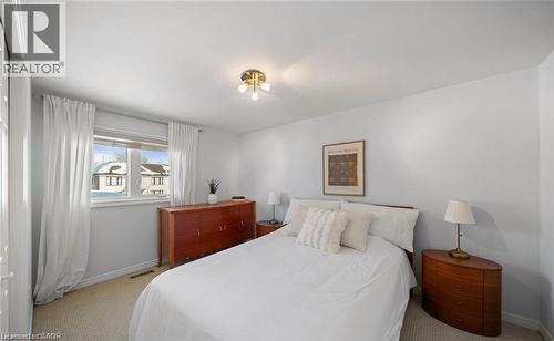 Bedroom with light carpet and baseboards - 1550 Woodeden Drive, Mississauga, ON - Indoor Photo Showing Bedroom