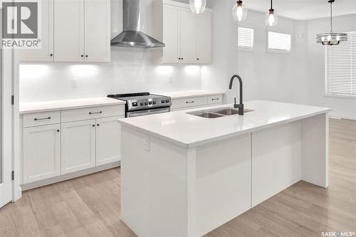 104 Forsey Avenue, Saskatoon, SK - Indoor Photo Showing Kitchen With Double Sink With Upgraded Kitchen