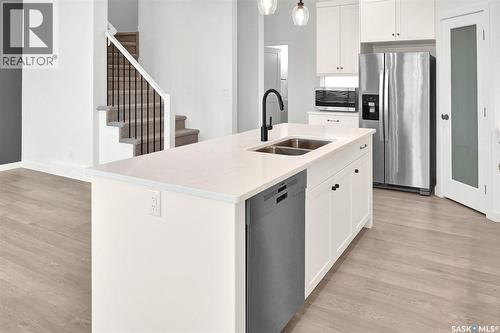 104 Forsey Avenue, Saskatoon, SK - Indoor Photo Showing Kitchen With Double Sink