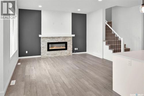 104 Forsey Avenue, Saskatoon, SK - Indoor Photo Showing Living Room With Fireplace