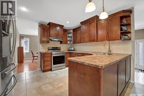 143 Biro Place, Saskatoon, SK - Indoor Photo Showing Kitchen With Double Sink