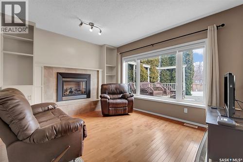 143 Biro Place, Saskatoon, SK - Indoor Photo Showing Living Room With Fireplace