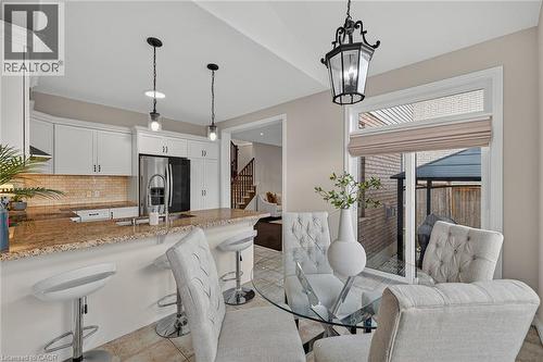 Dining room with stairs - 100 Garinger Crescent, Binbrook, ON - Indoor