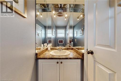 Half bathroom featuring vanity - 62 Como Place, Hamilton, ON - Indoor Photo Showing Bathroom