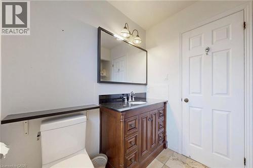 Bathroom with vanity and toilet - 62 Como Place, Hamilton, ON - Indoor