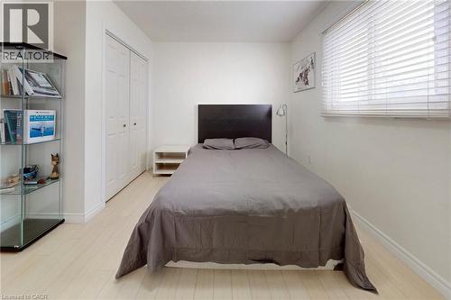 Bedroom featuring light wood-style flooring and a closet - 62 Como Place, Hamilton, ON - Indoor Photo Showing Bedroom