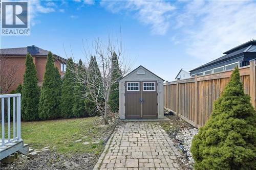 View of shed featuring a fenced backyard - 62 Como Place, Hamilton, ON - Outdoor