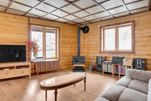 Salle familiale - 1907 Rue Grilli, Wentworth-Nord, QC - Indoor With Fireplace