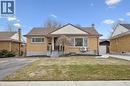 View of front of home featuring brick siding, a front lawn, a chimney, and an outdoor structure - 699 Frederick Street, Kitchener, ON  - Outdoor 