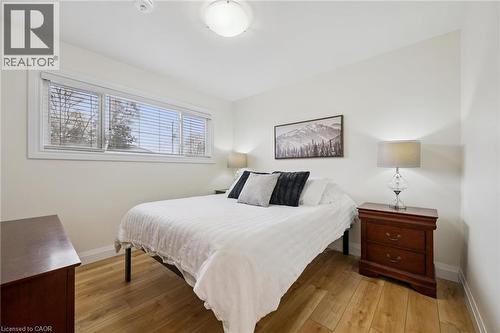 Bedroom featuring light wood-style floors and baseboards - 699 Frederick Street, Kitchener, ON - Indoor Photo Showing Bedroom