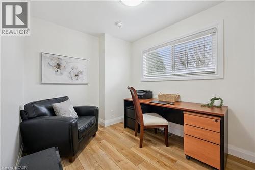 Home office with light wood-type flooring and baseboards - 699 Frederick Street, Kitchener, ON - Indoor Photo Showing Other Room