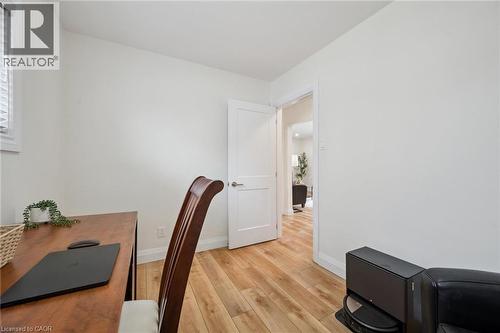 Office area with light wood-style flooring and baseboards - 699 Frederick Street, Kitchener, ON - Indoor