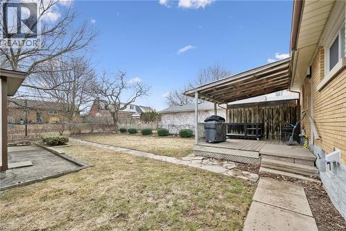 Fenced backyard with a deck - 699 Frederick Street, Kitchener, ON - Outdoor