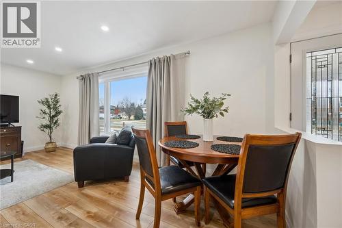 Dining room featuring light wood-style flooring and recessed lighting - 699 Frederick Street, Kitchener, ON - Indoor