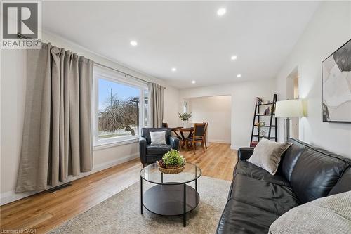 Living room with light wood-style floors and recessed lighting - 699 Frederick Street, Kitchener, ON - Indoor Photo Showing Living Room