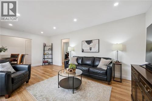 Living area featuring recessed lighting and light wood finished floors - 699 Frederick Street, Kitchener, ON - Indoor Photo Showing Living Room