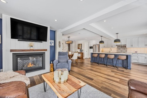 18 Peter Street, Amaranth, ON - Indoor Photo Showing Living Room With Fireplace