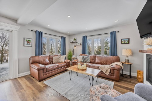 18 Peter Street, Amaranth, ON - Indoor Photo Showing Living Room With Fireplace