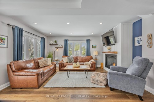 18 Peter Street, Amaranth, ON - Indoor Photo Showing Living Room With Fireplace