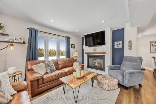 18 Peter Street, Amaranth, ON - Indoor Photo Showing Living Room With Fireplace