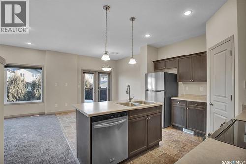 211 Mcbeth Crescent, Saskatoon, SK - Indoor Photo Showing Kitchen With Double Sink