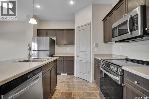 211 Mcbeth Crescent, Saskatoon, SK - Indoor Photo Showing Kitchen With Double Sink