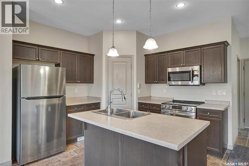 211 Mcbeth Crescent, Saskatoon, SK - Indoor Photo Showing Kitchen With Double Sink With Upgraded Kitchen
