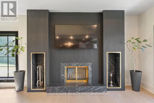 16 & 20 Garden Gate, Brock, ON - Indoor With Fireplace