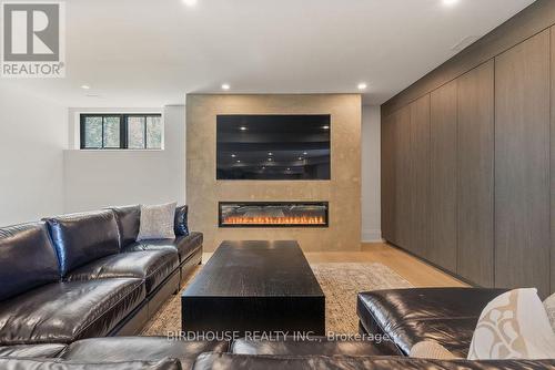 16 & 20 Garden Gate, Brock, ON - Indoor Photo Showing Living Room With Fireplace