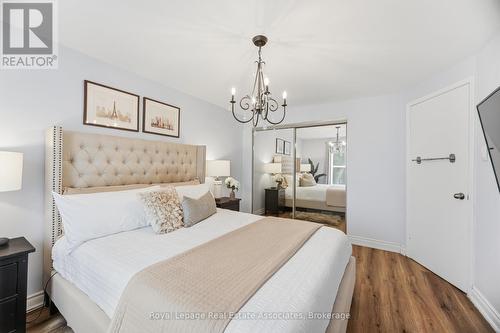 Primary bedroom - Pottery Barn Chandelier - 3368 Mainsail Crescent, Mississauga, ON - Indoor Photo Showing Bedroom