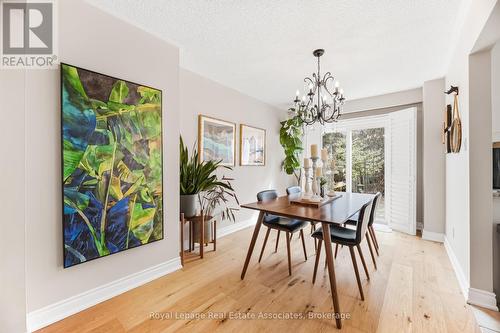 Dining area - Pottery Barn Chandelier - 3368 Mainsail Crescent, Mississauga, ON - Indoor Photo Showing Dining Room