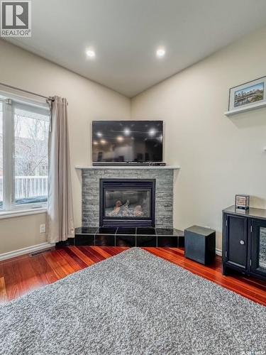 520 Palliser Drive, Swift Current, SK - Indoor Photo Showing Other Room With Fireplace