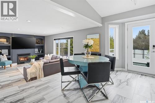 406 Laycoe Crescent, Saskatoon, SK - Indoor Photo Showing Dining Room With Fireplace