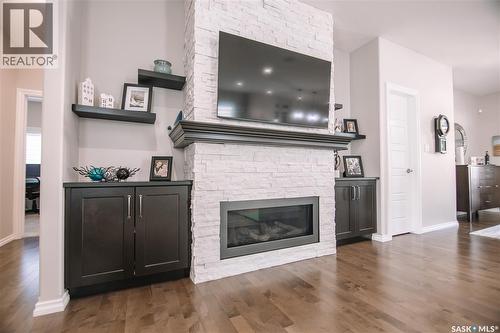 4960 Wright Road, Regina, SK - Indoor Photo Showing Living Room With Fireplace