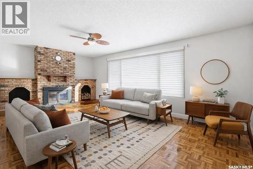 82 Burton Street, Grand Coulee, SK - Indoor Photo Showing Living Room With Fireplace