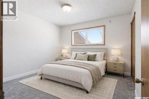 82 Burton Street, Grand Coulee, SK - Indoor Photo Showing Bedroom