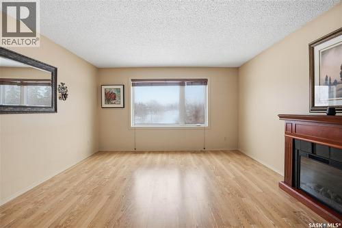 6914 Cunningham Drive, Regina, SK - Indoor With Fireplace