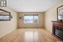 6914 Cunningham Drive, Regina, SK  - Indoor With Fireplace 