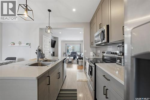 608 Brighton Gate, Saskatoon, SK - Indoor Photo Showing Kitchen With Double Sink With Upgraded Kitchen